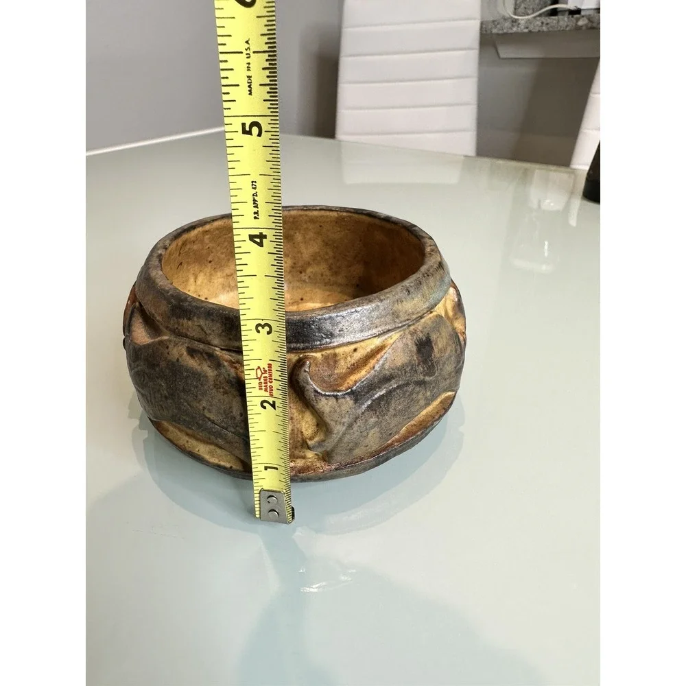 antique stone vase‎ with ornament in the form of fish